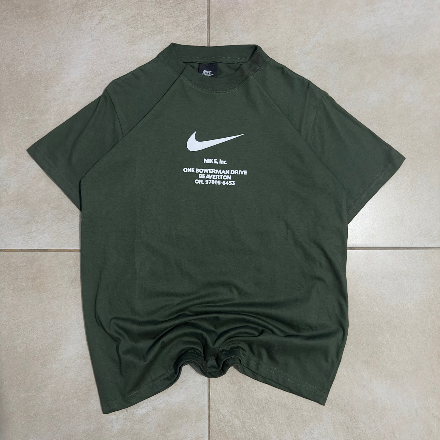 REMERA NIKE INC
