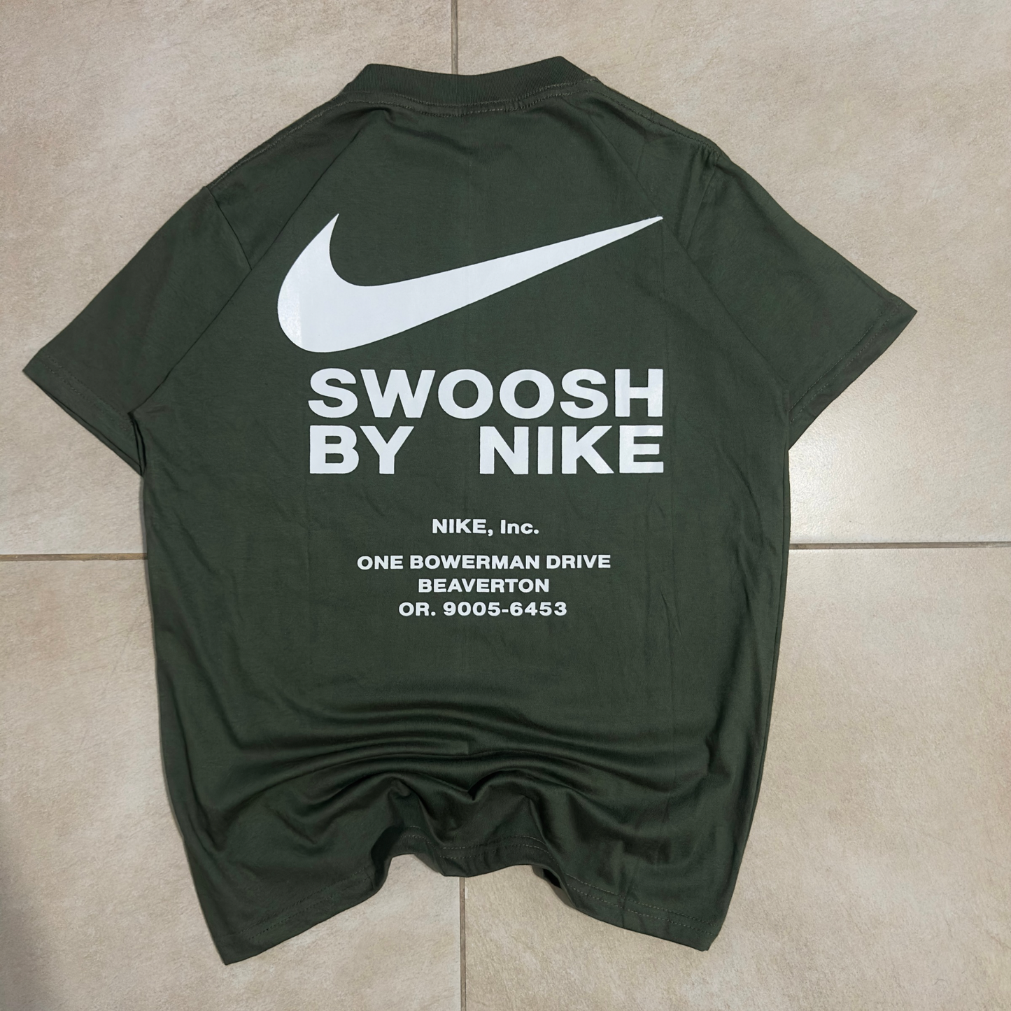 REMERA NIKE INC