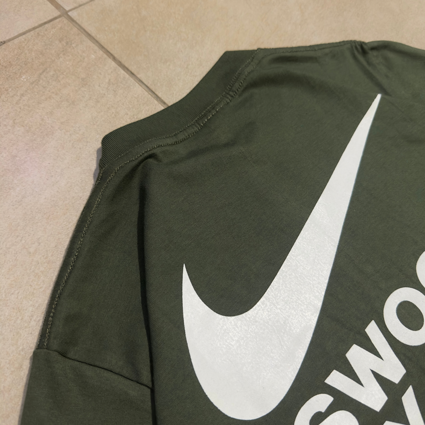 REMERA NIKE INC